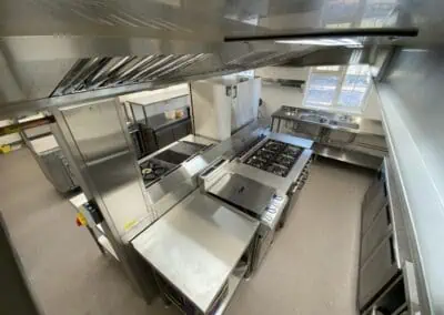commercial kitchen in a hotel from above, inox kitchen, hotel kitchen